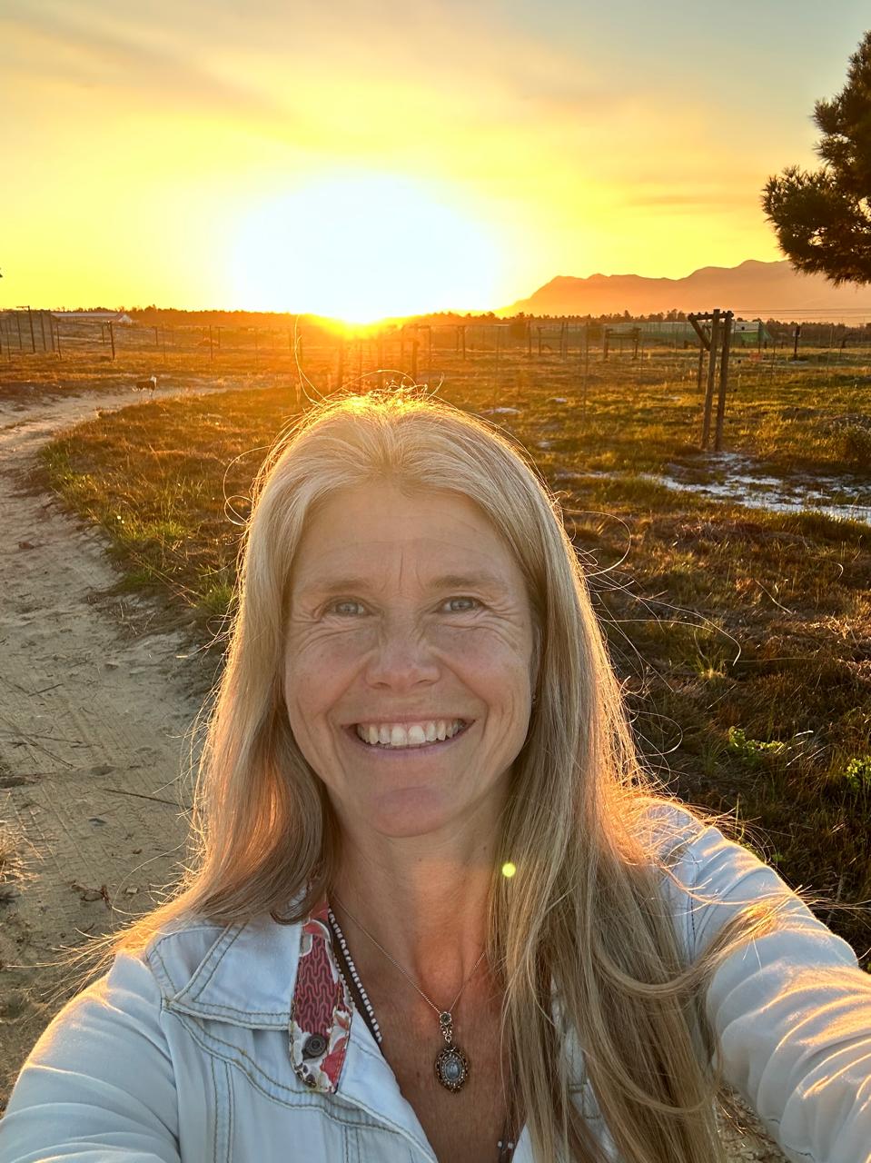 Cathrine LionHeart smiling at golden hour at Panthera Africa